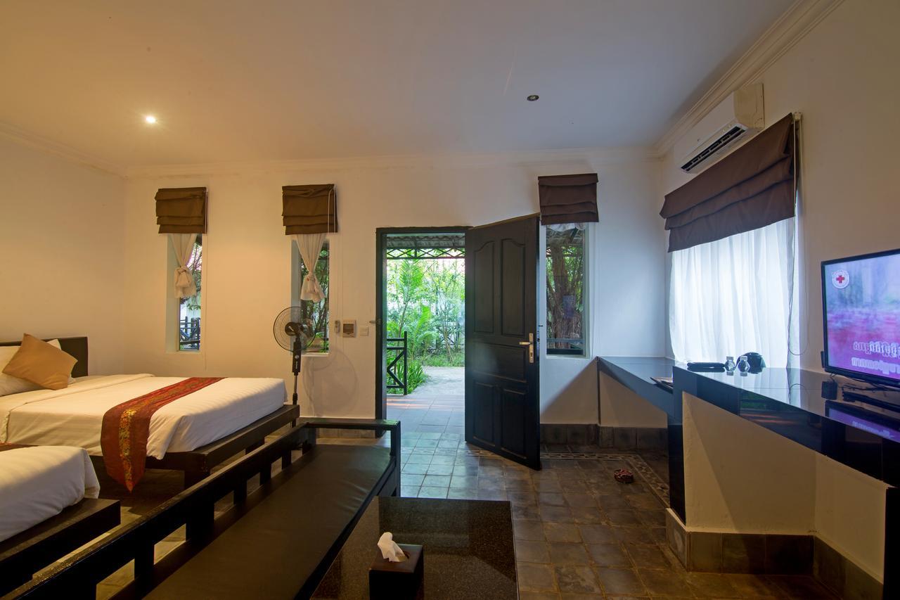 Nature Boutique Residence Siem Reap Quarto foto