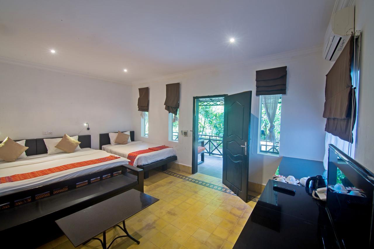 Nature Boutique Residence Siem Reap Quarto foto