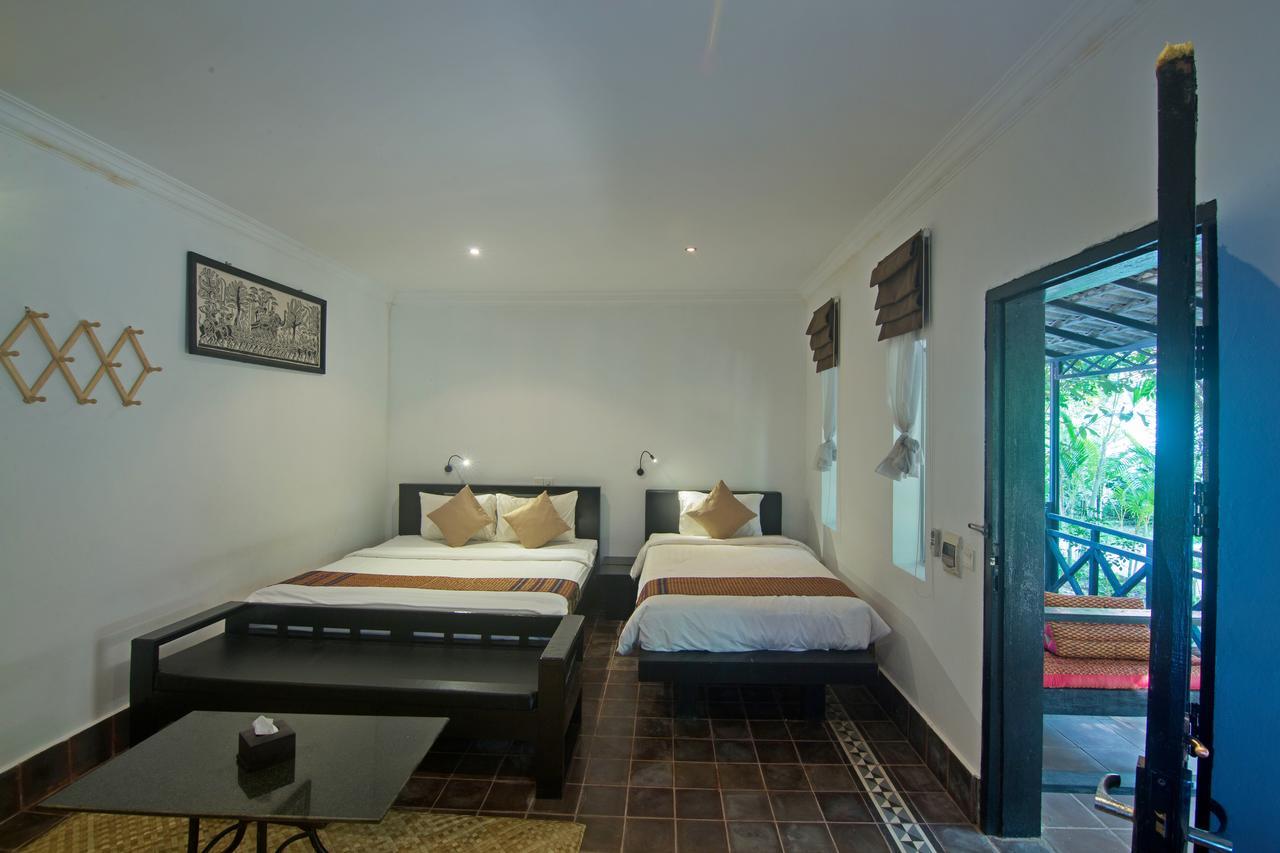 Nature Boutique Residence Siem Reap Quarto foto